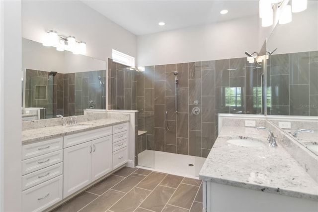 2132 Limestone Trl, Kissimmee, FL 34747 - bathroom featuring two vanities and walk in shower
