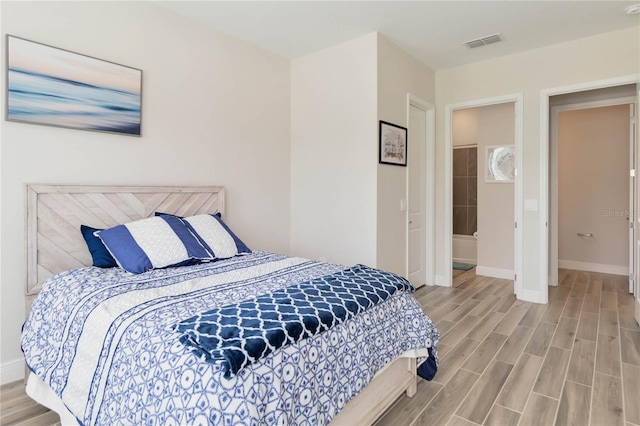 2132 Limestone Trl, Kissimmee, FL 34747 - bedroom featuring wood finished floors and baseboards