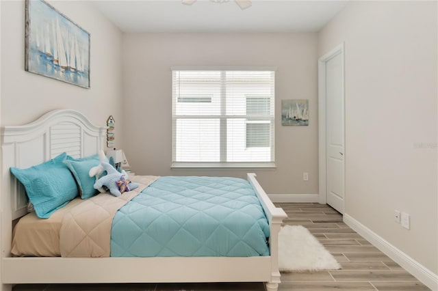 2132 Limestone Trl, Kissimmee, FL 34747 - bedroom featuring wood finished floors and baseboards
