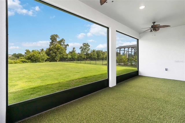 2132 Limestone Trl, Kissimmee, FL 34747 - unfurnished sunroom with a ceiling fan