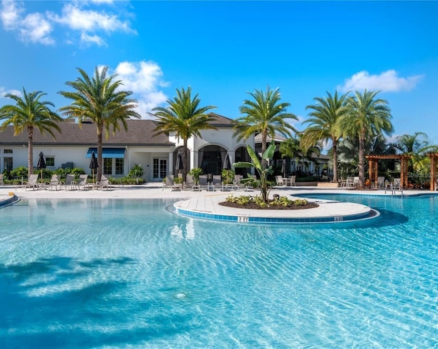 2132 Limestone Trl, Kissimmee, FL 34747 - community pool featuring a patio