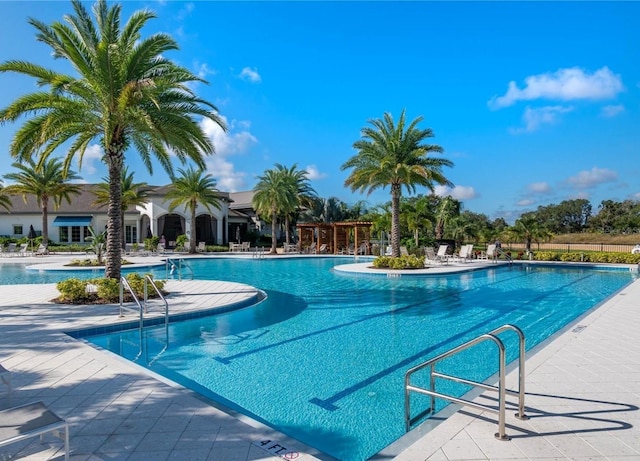 2132 Limestone Trl, Kissimmee, FL 34747 - community pool featuring a patio area