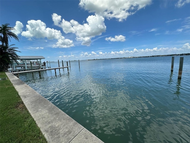 413 Midway Is, Clearwater Beach, FL 33767 - dock area featuring a water view and boat lift