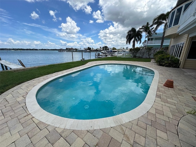 413 Midway Is, Clearwater Beach, FL 33767 - outdoor pool with a water view and a patio