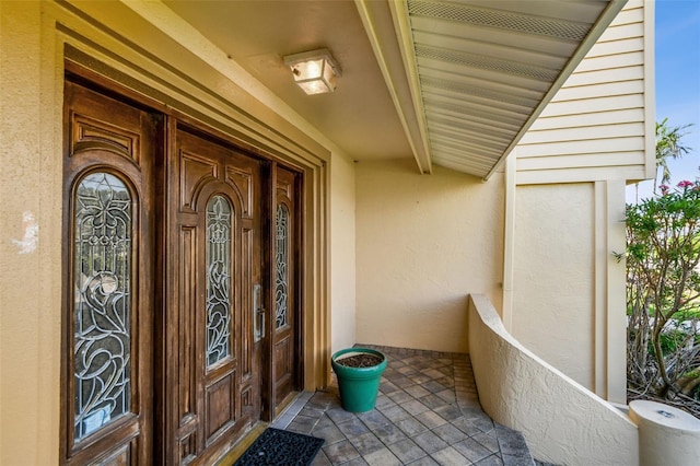 413 Midway Is, Clearwater Beach, FL 33767 - property entrance with stucco siding
