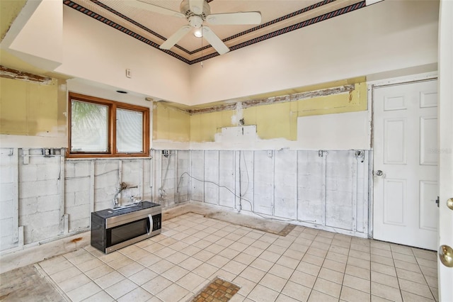 413 Midway Is, Clearwater Beach, FL 33767 - unfurnished room featuring ceiling fan and light tile patterned floors
