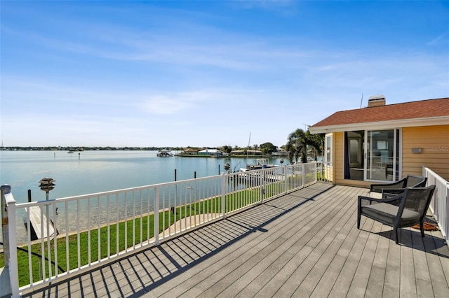 413 Midway Is, Clearwater Beach, FL 33767 - deck featuring a water view and a lawn