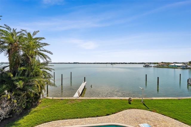 413 Midway Is, Clearwater Beach, FL 33767 - dock with a water view and a yard
