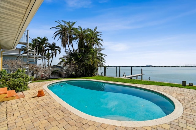 413 Midway Is, Clearwater Beach, FL 33767 - view of swimming pool featuring a water view and a patio