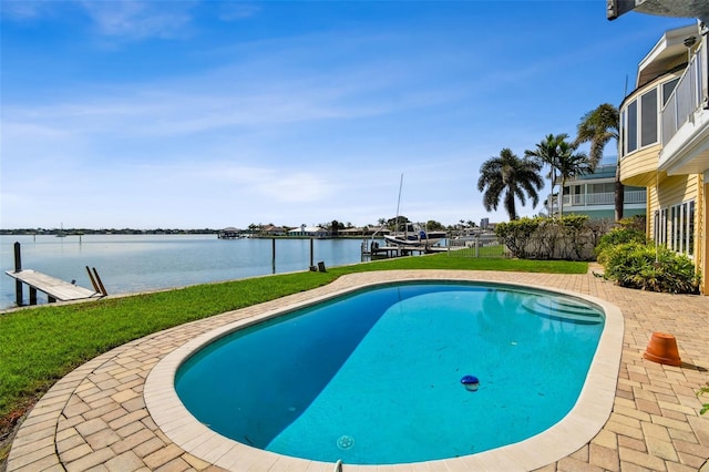 413 Midway Is, Clearwater Beach, FL 33767 - swimming pool featuring a dock, a water view, and a yard