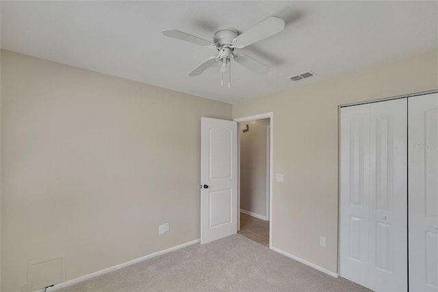1331 Coolmont Dr, Brandon, FL 33511 - unfurnished bedroom featuring a closet, light colored carpet, and ceiling fan