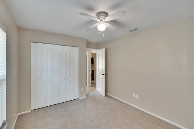 1331 Coolmont Dr, Brandon, FL 33511 - unfurnished bedroom with a closet, carpet flooring, and a ceiling fan