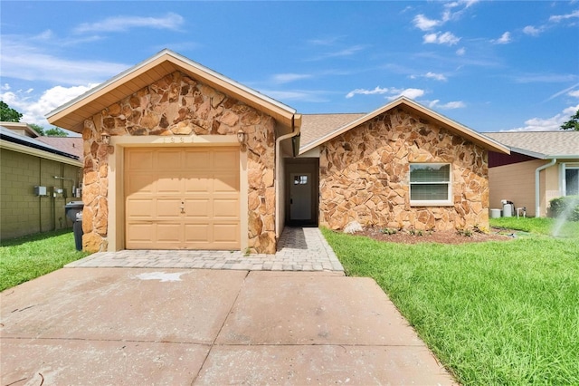 1331 Coolmont Dr, Brandon, FL 33511 - view of front of home with stone siding, a garage, a front lawn, and driveway