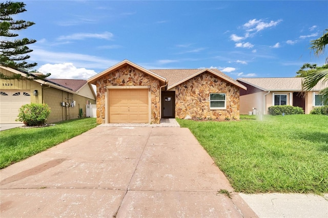 1331 Coolmont Dr, Brandon, FL 33511 - view of front facade with stone siding, a front yard, and driveway