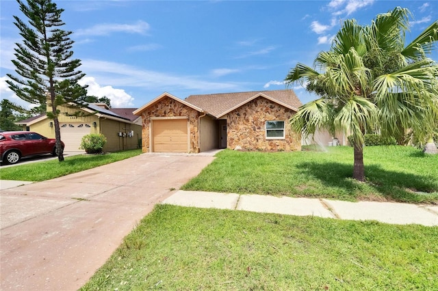 1331 Coolmont Dr, Brandon, FL 33511 - view of front of property with stone siding, a garage, concrete driveway, and a front lawn