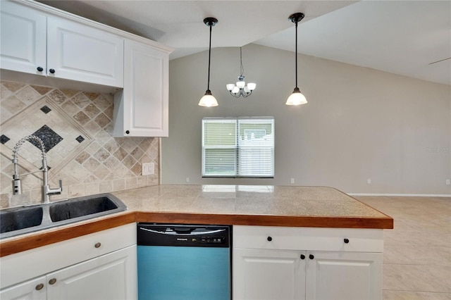 1331 Coolmont Dr, Brandon, FL 33511 - kitchen with dishwasher, tile countertops, decorative backsplash, a peninsula, and vaulted ceiling