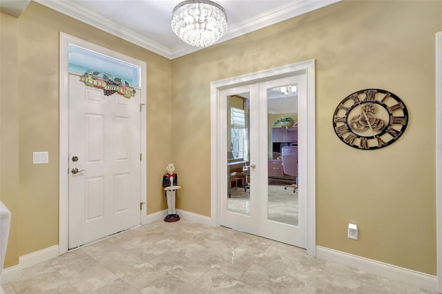 5518 Luminar Pointe Ln, Apollo Beach, FL 33572 - entrance foyer with french doors, crown molding, and a chandelier