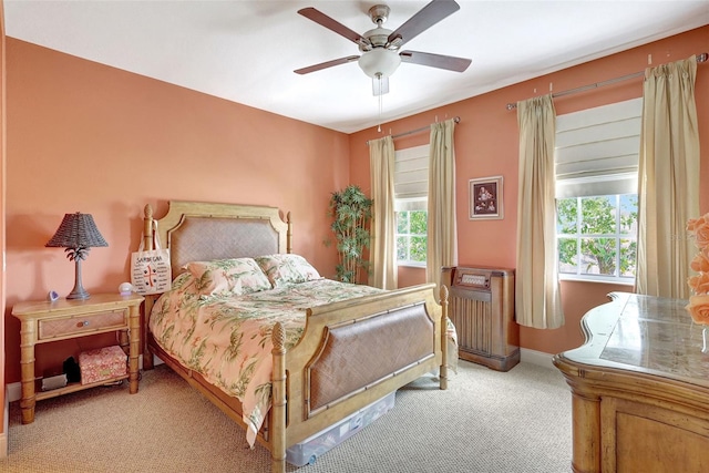 5518 Luminar Pointe Ln, Apollo Beach, FL 33572 - carpeted bedroom featuring radiator heating unit and ceiling fan