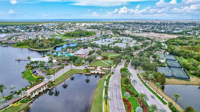 5518 Luminar Pointe Ln, Apollo Beach, FL 33572 - aerial view of property and surrounding area featuring a large body of water and nearby suburban area