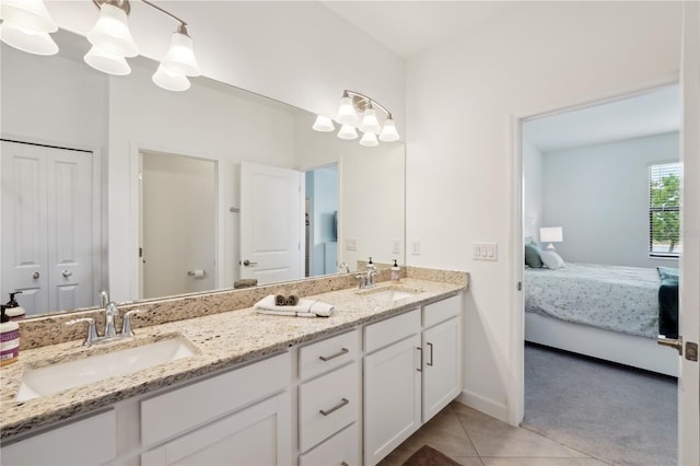 13880 Pine Lodge Ln, Fort Myers, FL 33913 - bathroom featuring double vanity, connected bathroom, a chandelier, and tile patterned flooring