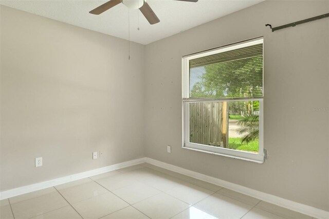 915 S Miller Rd, Valrico, FL 33594 - empty room with ceiling fan and light tile patterned floors