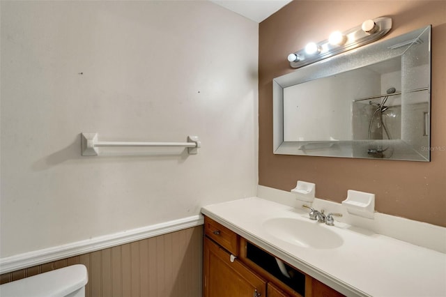 915 S Miller Rd, Valrico, FL 33594 - bathroom featuring wainscoting, vanity, and a shower