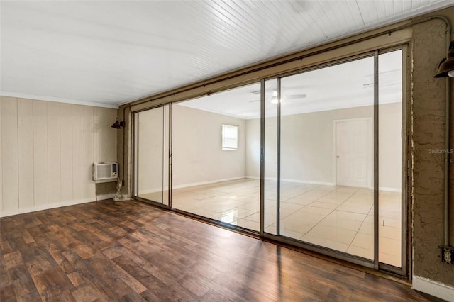 915 S Miller Rd, Valrico, FL 33594 - interior space with wood finished floors, an AC wall unit, and a closet