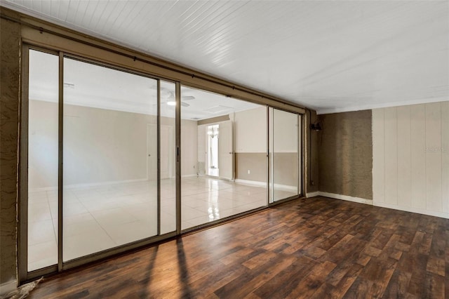 915 S Miller Rd, Valrico, FL 33594 - spare room featuring wood finished floors and baseboards