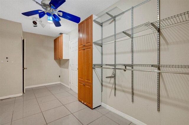 915 S Miller Rd, Valrico, FL 33594 - walk in closet featuring ceiling fan and light tile patterned flooring