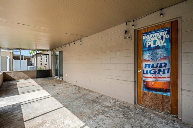915 S Miller Rd, Valrico, FL 33594 - doorway to property with concrete block siding