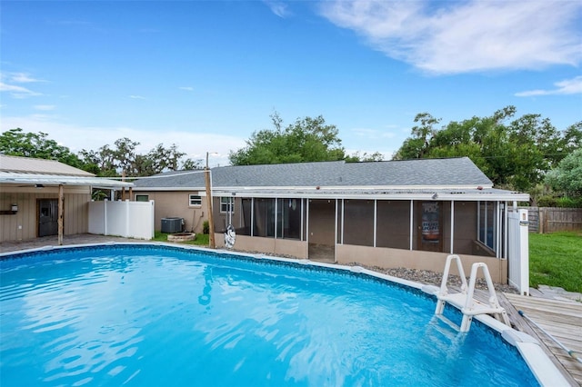 915 S Miller Rd, Valrico, FL 33594 - view of swimming pool featuring a sunroom