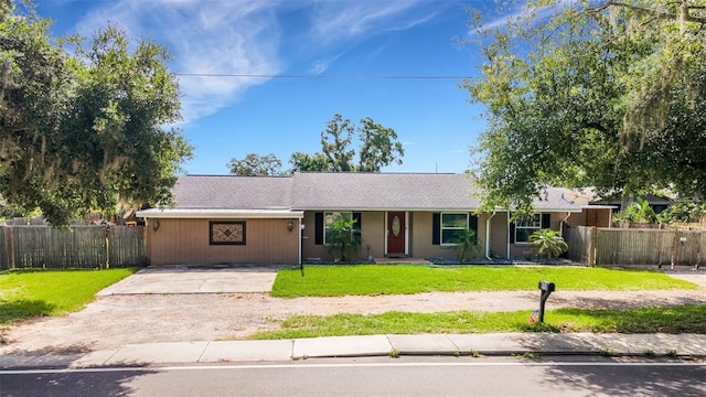915 S Miller Rd, Valrico, FL 33594 - ranch-style house with driveway and covered porch