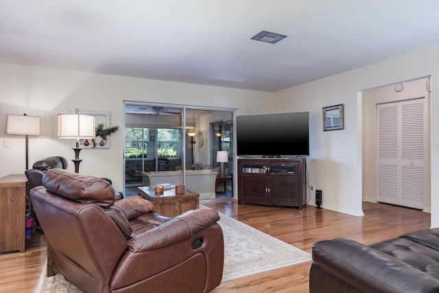 1510 Palmer Ct, Palm Harbor, FL 34685 - living area with wood finished floors