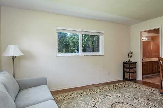 1510 Palmer Ct, Palm Harbor, FL 34685 - living area featuring wood finished floors and baseboards