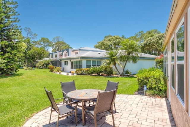 1510 Palmer Ct, Palm Harbor, FL 34685 - view of patio / terrace featuring outdoor dining space