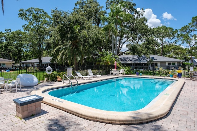 1510 Palmer Ct, Palm Harbor, FL 34685 - community pool with a patio