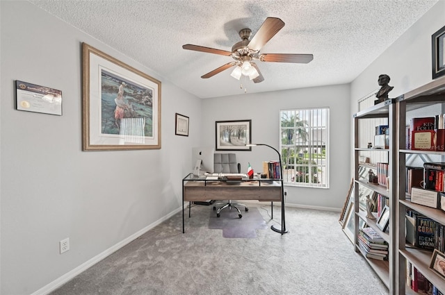 2306 Emerald Lake Dr, Sun City Center, FL 33573 - carpeted office with ceiling fan and a textured ceiling