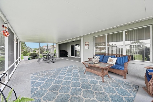 2306 Emerald Lake Dr, Sun City Center, FL 33573 - sunroom featuring an outdoor living space