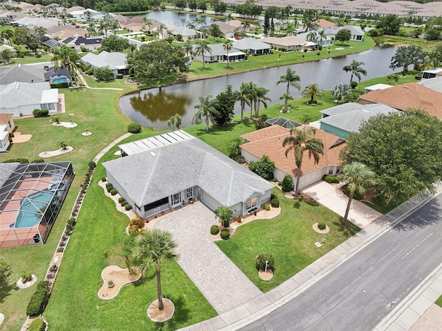 2306 Emerald Lake Dr, Sun City Center, FL 33573 - aerial overview of property's location featuring a large body of water and nearby suburban area