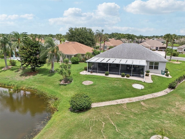 2306 Emerald Lake Dr, Sun City Center, FL 33573 - aerial perspective of suburban area featuring a large body of water