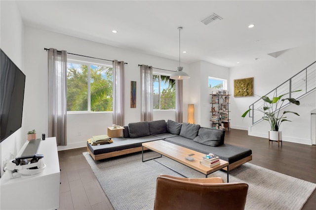 3100 W Paul Ave Unit 14, Tampa, FL 33611 - living area featuring plenty of natural light, wood finished floors, and recessed lighting