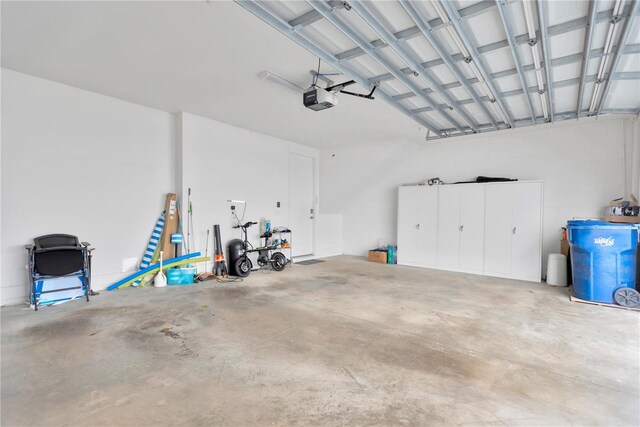 3100 W Paul Ave Unit 14, Tampa, FL 33611 - garage with a garage door opener