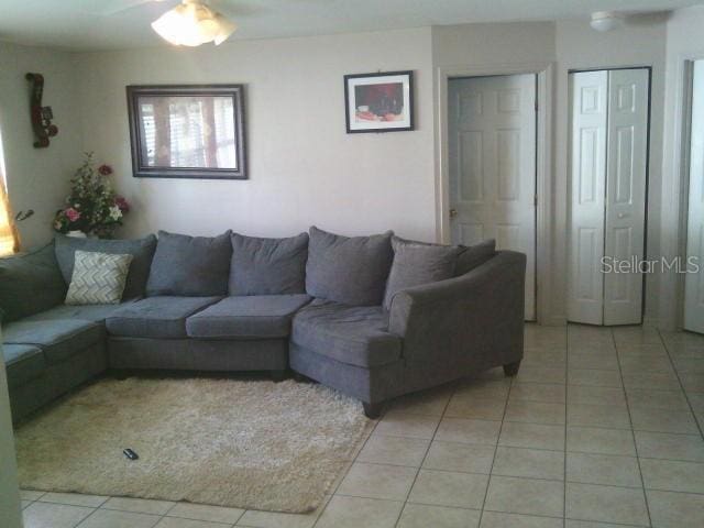 2429/2431 Quentin Ave S, Lehigh Acres, FL 33973 - living area featuring light tile patterned floors