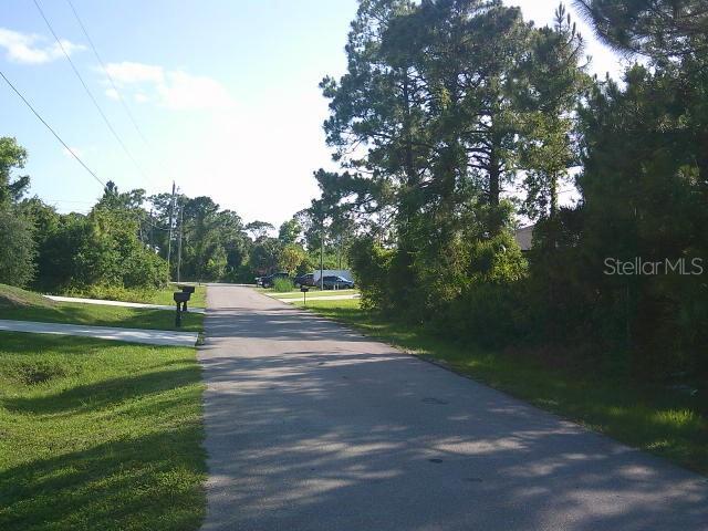 2429/2431 Quentin Ave S, Lehigh Acres, FL 33973 - view of asphalt road