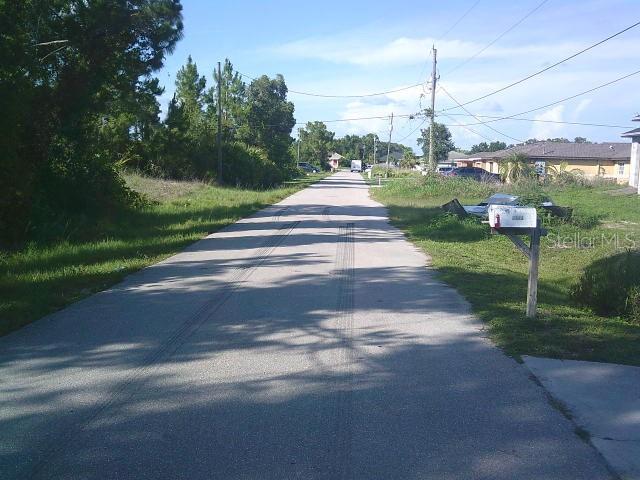 2429/2431 Quentin Ave S, Lehigh Acres, FL 33973 - view of asphalt road