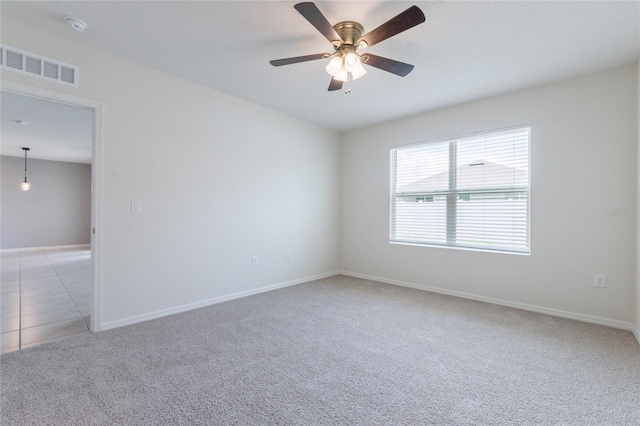3079 Bethpage Loop, Mount Dora, FL 32757 - unfurnished room featuring light carpet, a ceiling fan, and a smoke detector