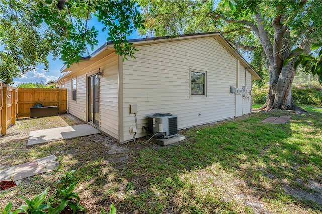 2901 Bay View Dr, Safety Harbor, FL 34695 - view of side of property featuring a central air condition unit