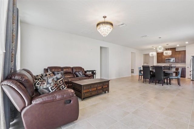 13515 Palmera Vista Dr, Riverview, FL 33579 - living area featuring a chandelier, light tile patterned floors, and recessed lighting