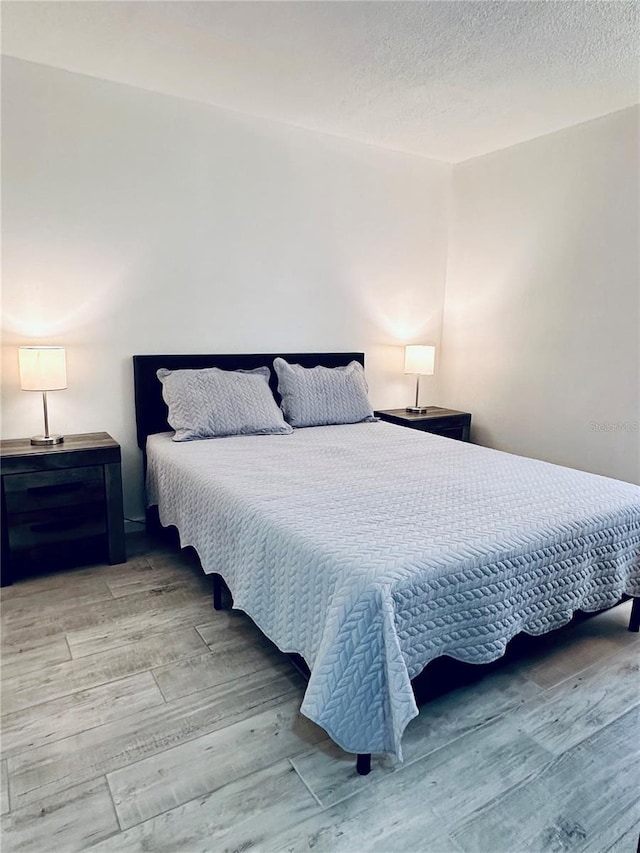 13186 Thrush St, Spring Hill, FL 34609 - bedroom with wood finished floors