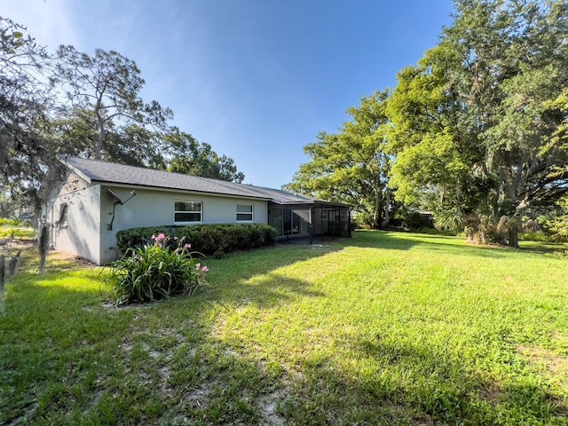 4404 Hickory Branch Ct, Brandon, FL 33511 - view of grassy yard featuring a lanai